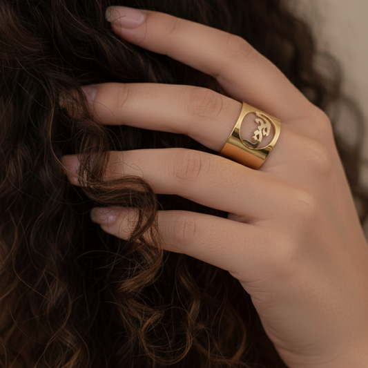 arabic name ring on a woman's finger