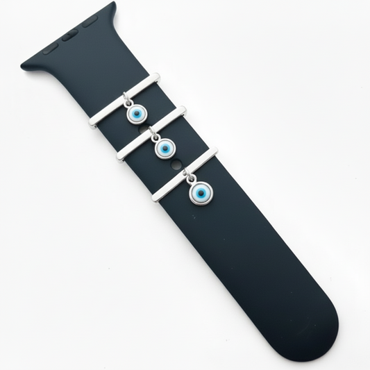 Black watch strap with silver accents with evil eye smart watch band add on on a white background