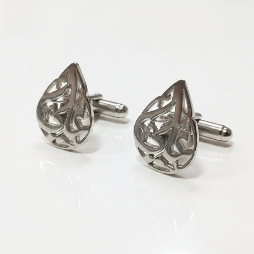 Silver cufflinks with arabic name calligraphy in teardrop shape on a white background