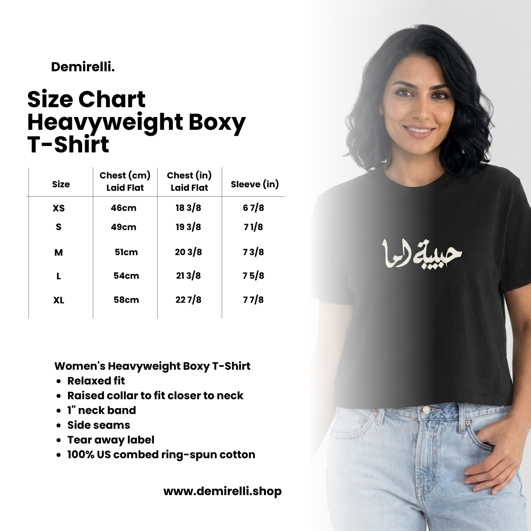 Woman wearing a black t-shirt with text, size chart on the left, Demirelli branding.