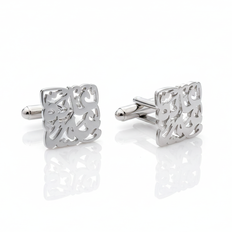 Pair of silver square cufflinks with arabic calligraphy design on a white background