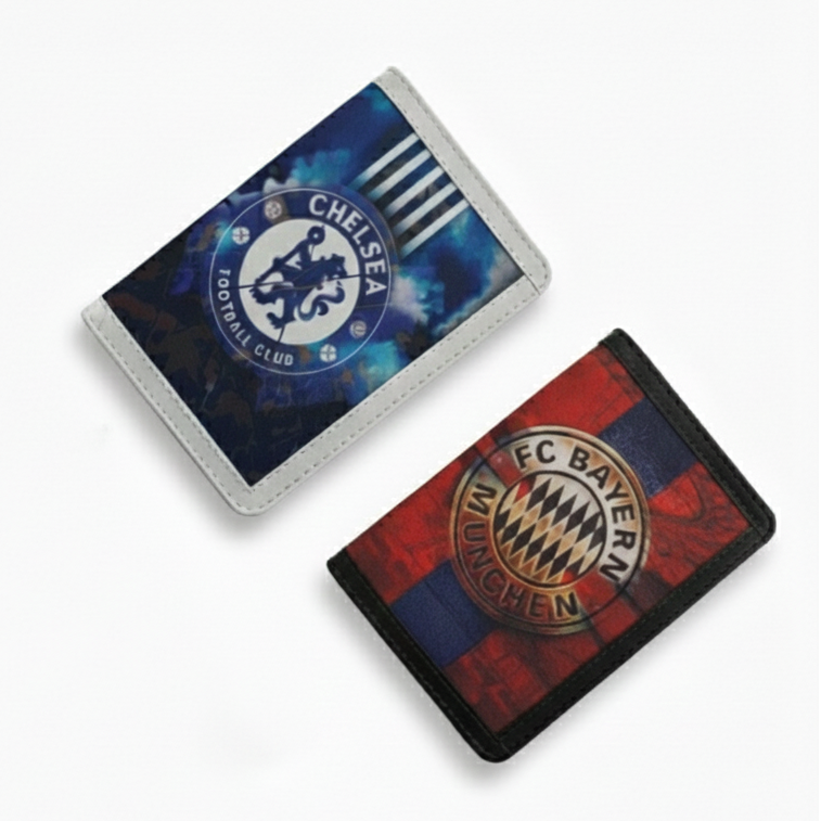 Two passport covers with Chelsea and Bayern Munich logos on a white background