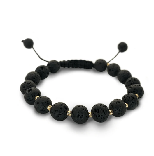 Black beaded bracelet with gold accents on a white background