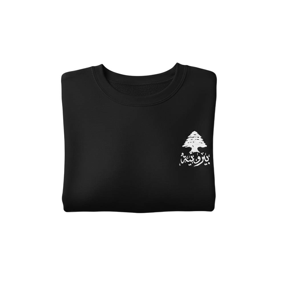 black sweatshirt on a white background with cedar on it in white and written lebanese on the side