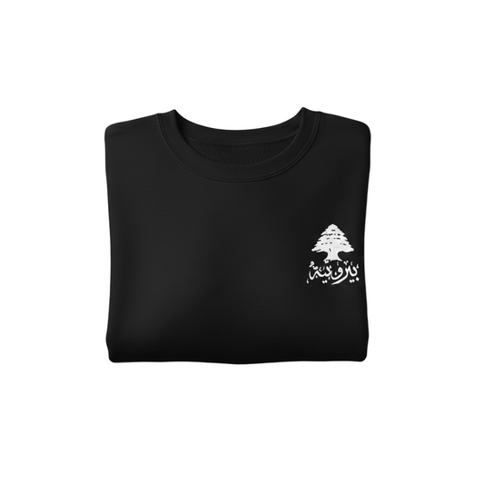 black sweatshirt on a white background with cedar on it in white and written lebanese on the side