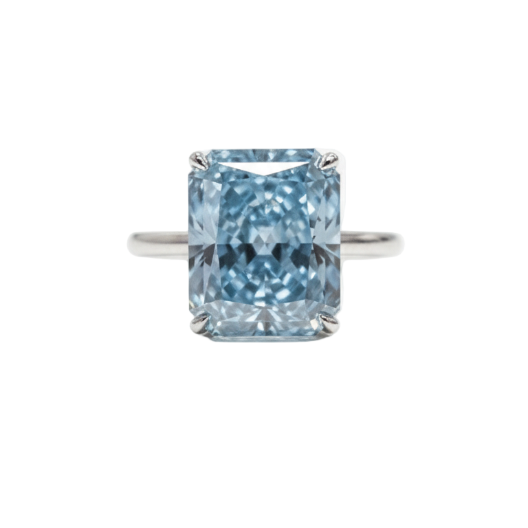 Blue diamond ring on a white background