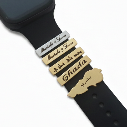 Smartwatch with a black band featuring engraved names on a white background