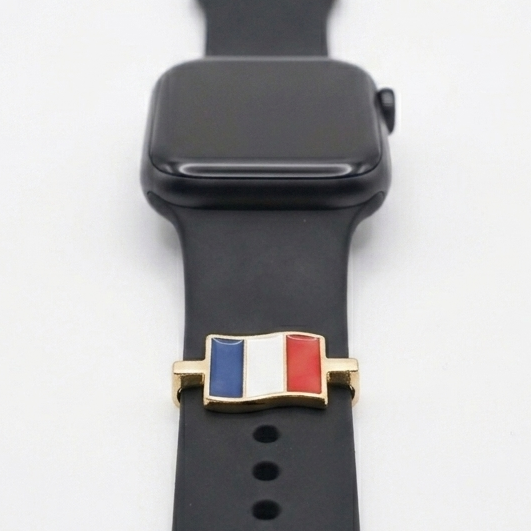 Smartwatch with a black band featuring a france flag design on a white background