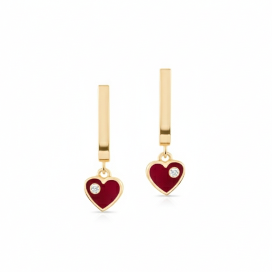 Gold heart-shaped earrings with red accents on a white background