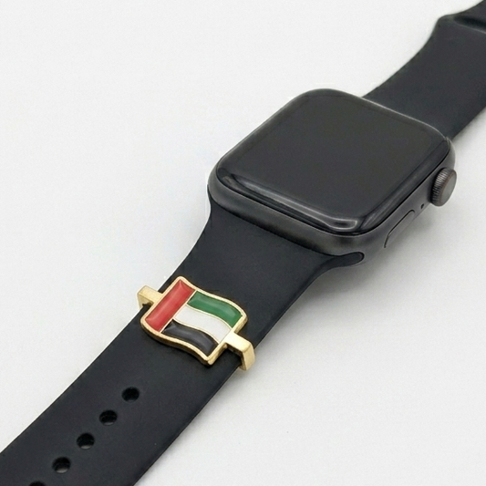 black smartwatch with jordan enamel map charm on a white background