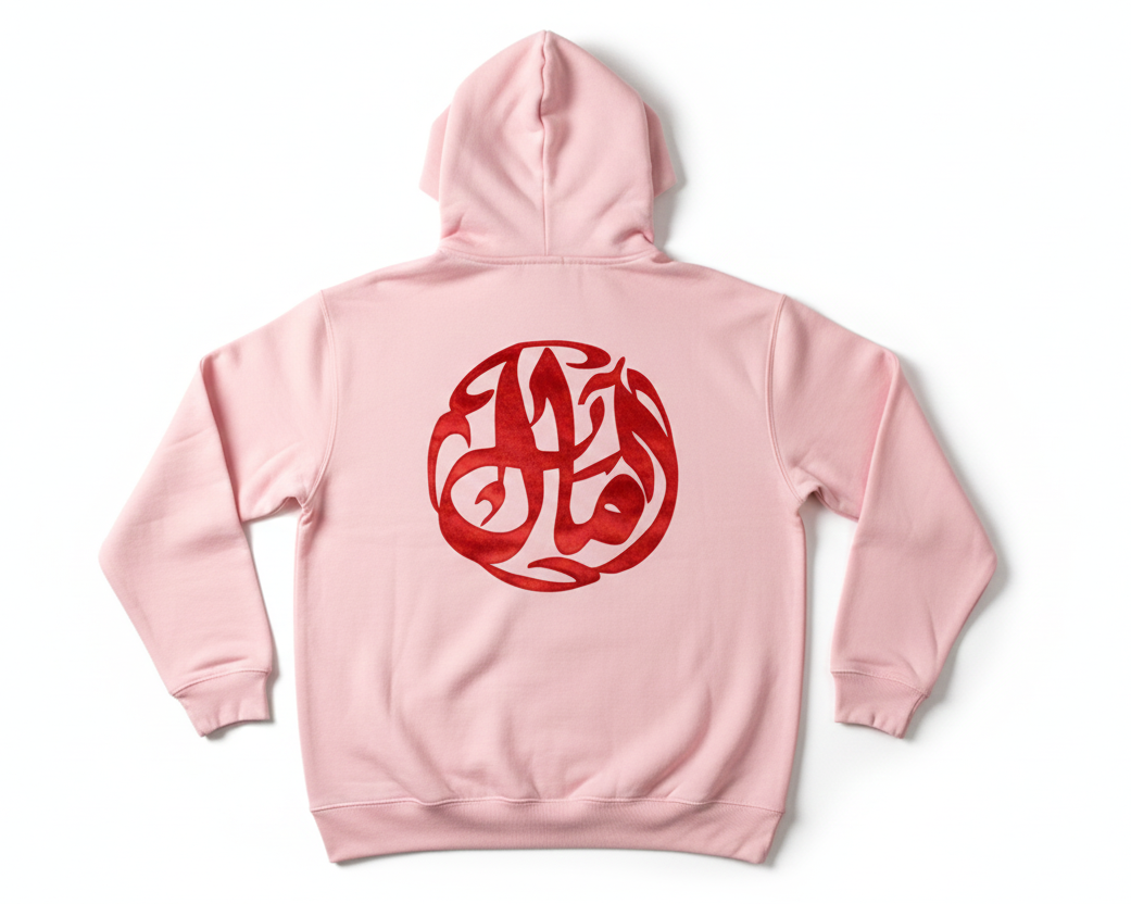 Pink hoodie with a red circular design on the back against a white background