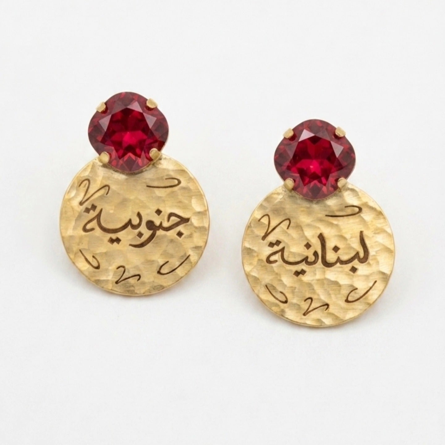 arabic calligraphy earrings with ed swarovski on a white background