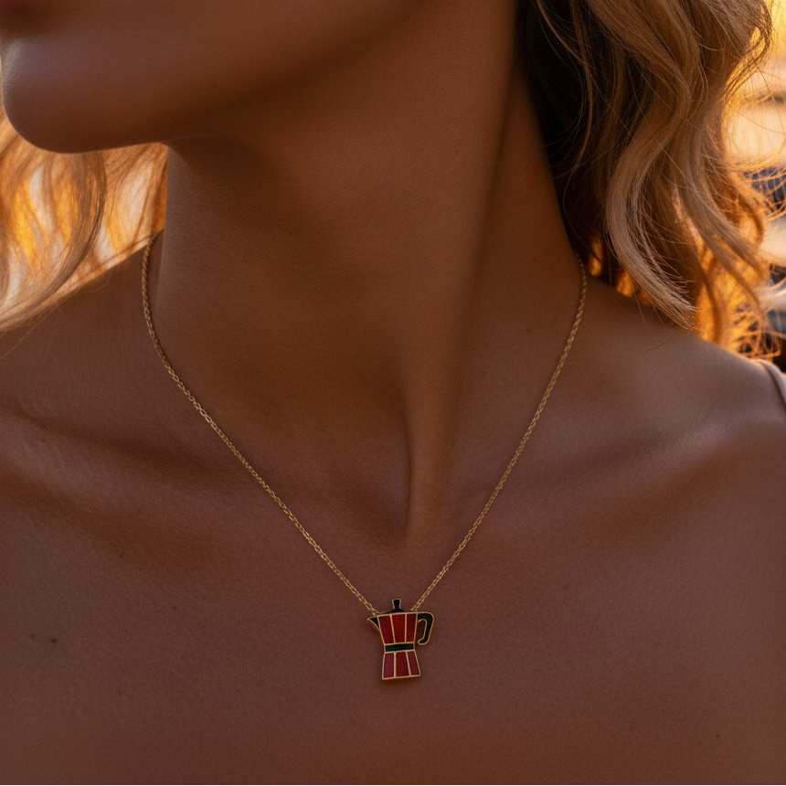 moka oro collection:  a red moka pot necklace on a woman's neck