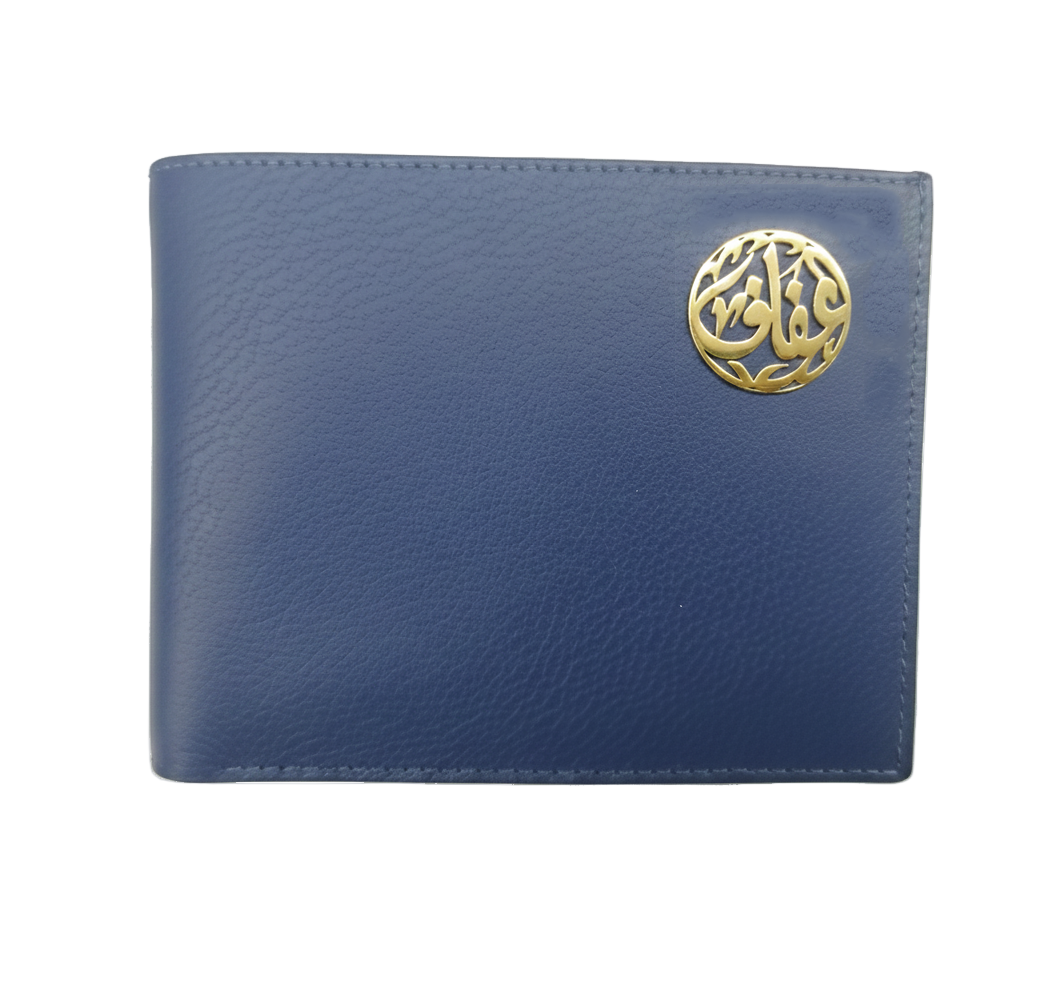 a personalized blue leather wallet with arabic calligraphy gold name on a white background