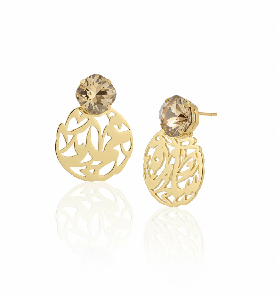 Gold earrings with arabic calligraphy name designs and gold shadow swarovski gemstones on a white background