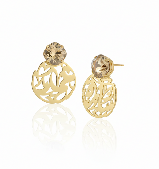 Gold earrings with arabic calligraphy name designs and gold shadow swarovski gemstones on a white background