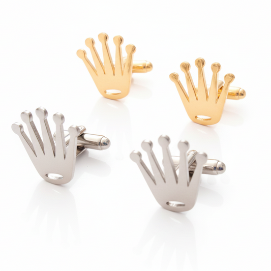 Two pairs of crown-shaped rolex logo cufflinks, one silver and one gold, on a white background.