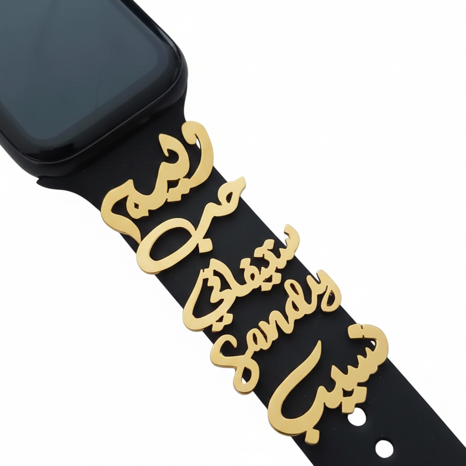 Black smartwatch with a black band on a white background with gold names 