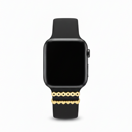 Black smartwatch with a gold flower and hearts design on black band on a white background