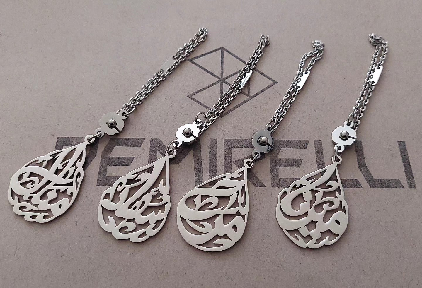 Teardrop Name Keychain by Demirelli, elegant personalized keyring with custom name engraving in a sleek teardrop design