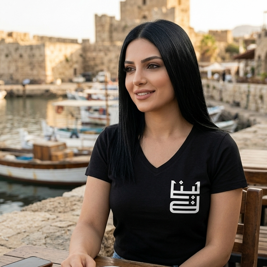 a photo of a woman wearing lebanon vneck tee in jbeil restaurant